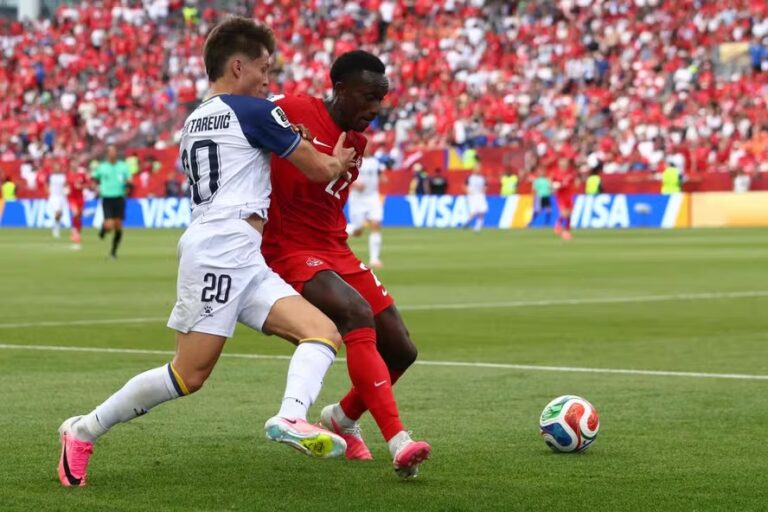 115242901-bosnia-herzegovinas-forward-20-esmir-bajraktarevic-l-fights-for-the-ball-with-canada